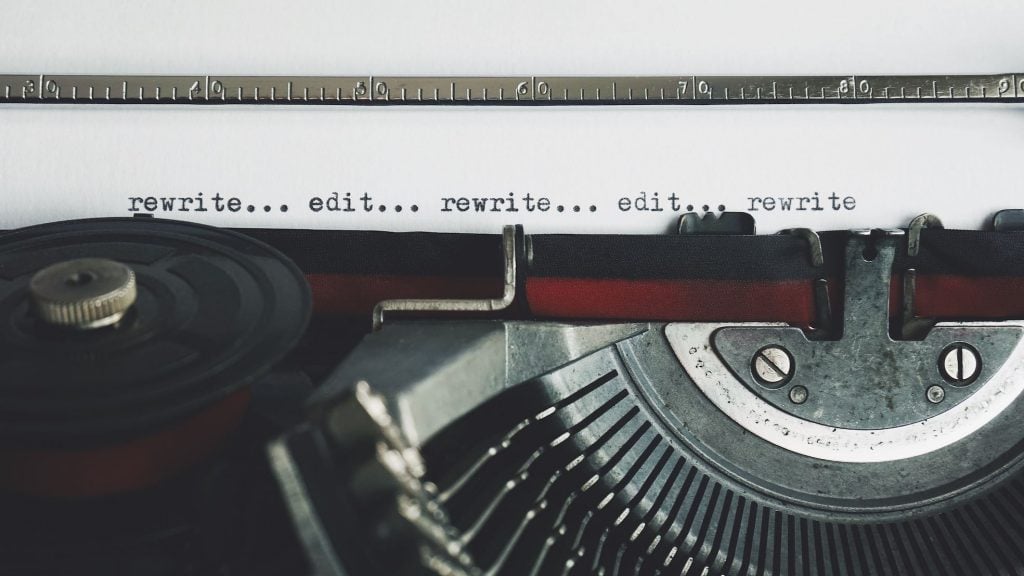 How to write in English using a typewriter. English editing banner with basic grammar example.